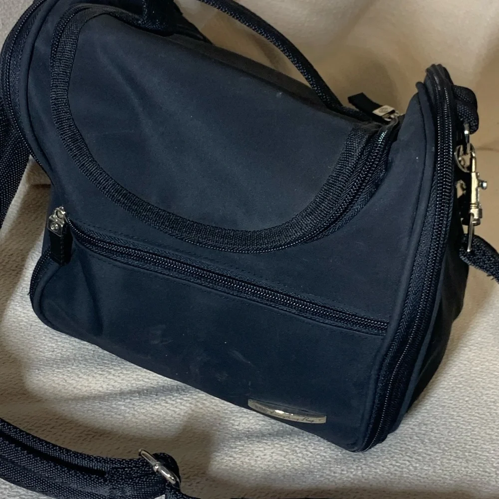 black travel bag for make up or toiletries